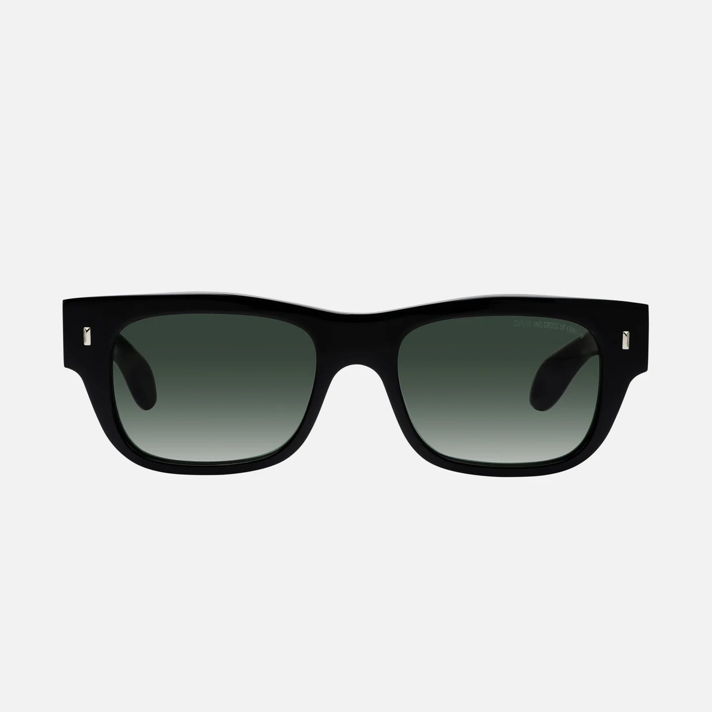 Black sunglasses with gradient lenses on a light gray background